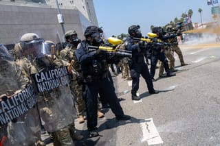 Demonstrators protest outside a downtown jail in Los Angeles following two days of clashes with police during a series of immigration raids on June 08, 2025 in Los Angeles, California.