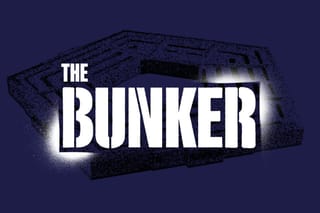 The Bunker logo, done in military stencil, in front of the Pentagon building