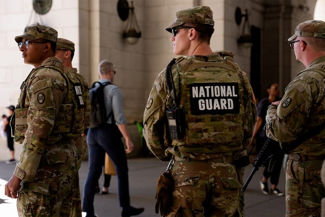 National Guard members standing outside of Union Station in Washington, DC.