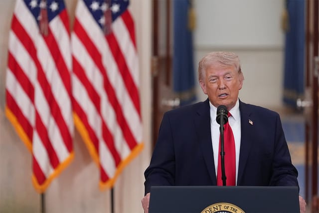 President Donald Trump speaks from the Cross Hall of the White House.