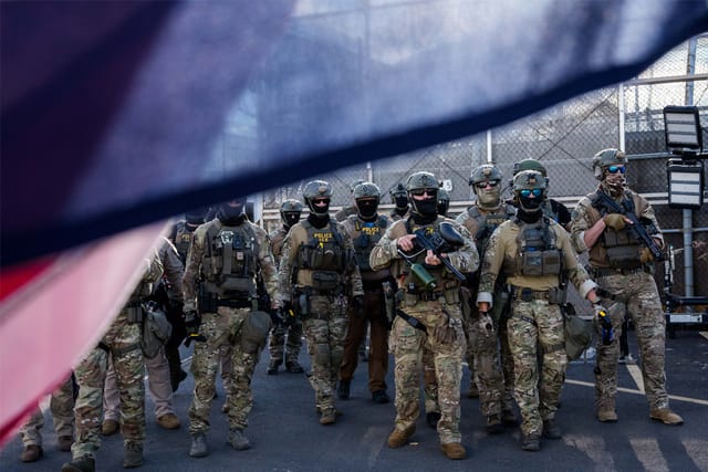 Immigration and Customs Enforcement (ICE) agents face off with protesters during a shift change outside of Delaney Hall Immigration Detention Center on June 7, 2026 in Newark, New Jersey.