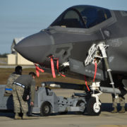 A U.S. Air Force weapons load crew loads a live AIM-120 advanced medium-range air-to-air missile into an F-35A January 31, 2017, at Eglin Air Force Base, Florida.