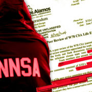 An NNSA employee in front of documents obtained by POGO